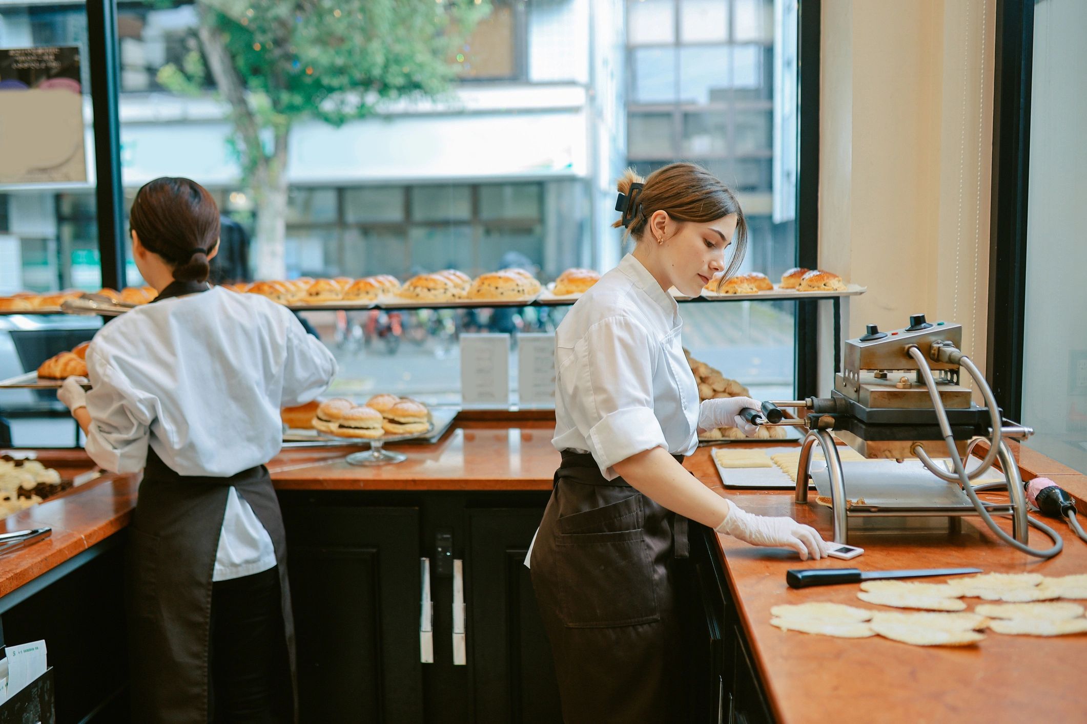 Bakery team members working behind the counter