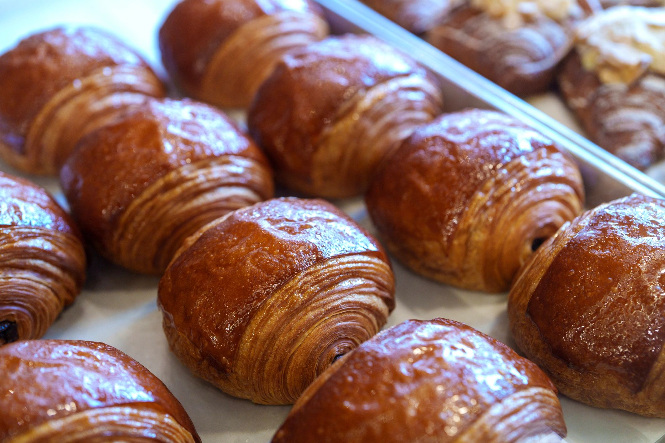 Pain au chocolat pastries on a bakery tray