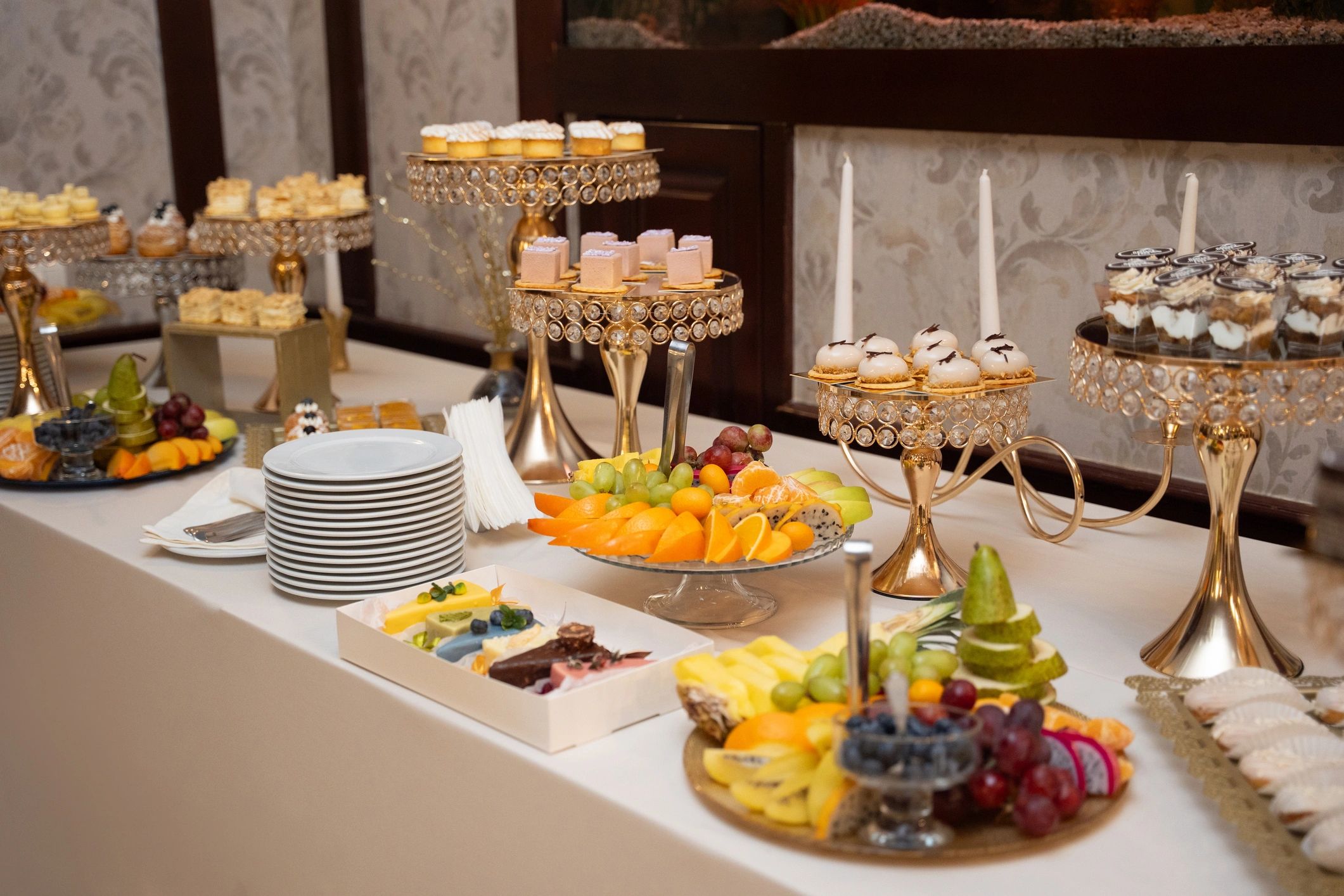 Assorted pastries and desserts arranged on a display table
